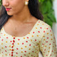 Bright Cream Shade Full Flare Bandani Anarkali Kurta